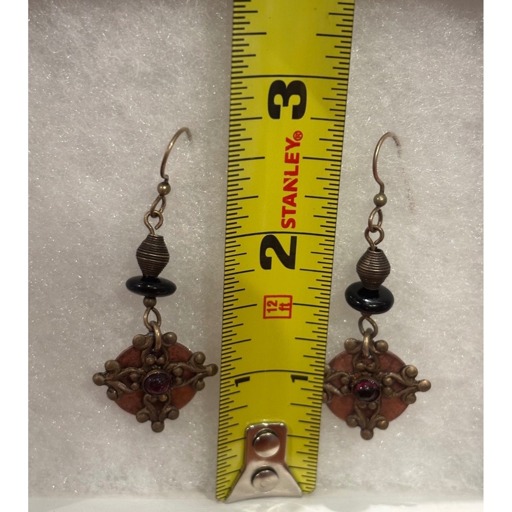 Artisan Boho
Antiqued Bronze Filigree Dangle Earrings Dark Red/Garnet Stone
Bead - Picture 2 of 4